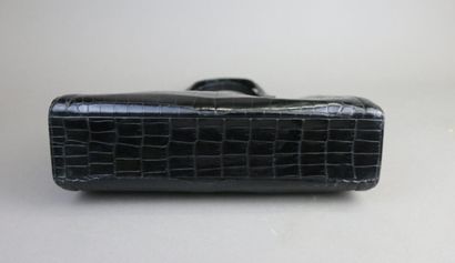 HERMÈS Paris
Pullman bag in black crocodile
Gold-plated...