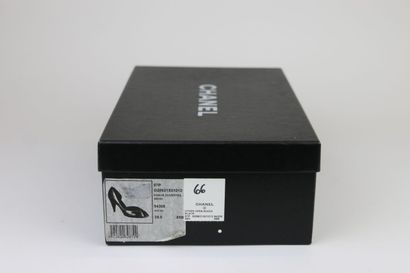 CHANEL
Pair of black patent pumps, open toe....