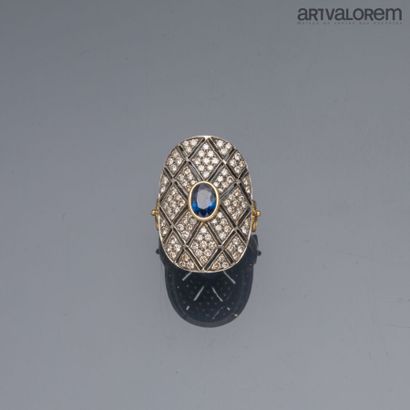 Ring in yellow gold 750°/°° and silver, the...