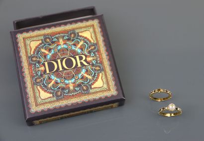 DIOR
Two gold-plated rings set with faceted...