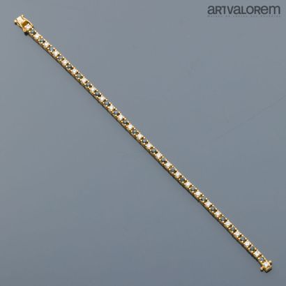 Line bracelet in 750°/°° yellow gold set...