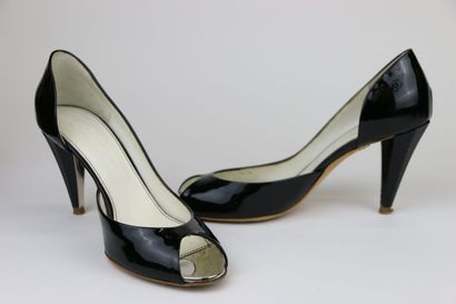 CHANEL
Pair of black patent pumps, open toe....