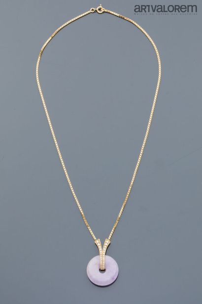 750°/°° yellow gold necklace adorned with...