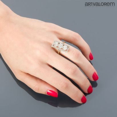 Yellow gold 750°/°° and platinum marquise...