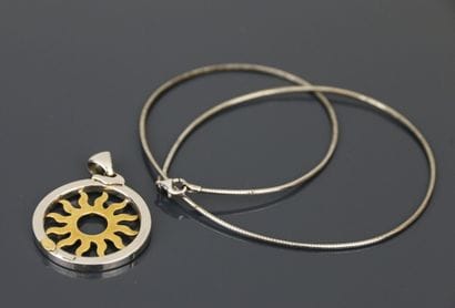 Two-tone gold 750°/°° medallion pendant with...