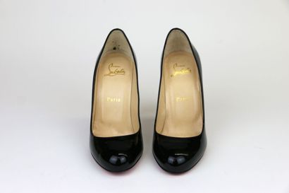 LOUBOUTIN
A pair of black patent leather...