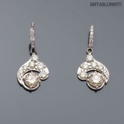 Pendant and earring in 750°/°° white gold...