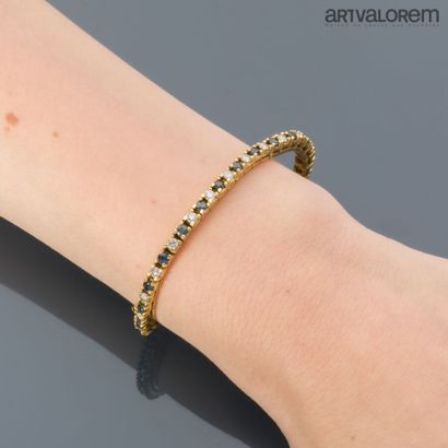 Line bracelet in 750°/°° yellow gold set...