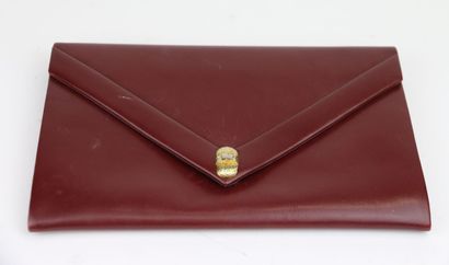 YVES SAINT LAURENT Paris
Burgundy leather...