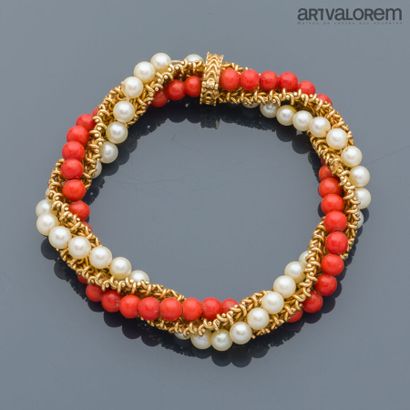 Twisted bracelet in yellow gold 750°/°° composed...