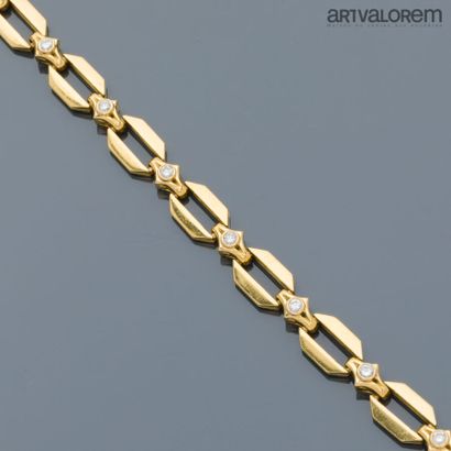 Bracelet in yellow gold 750°/°° articulated...