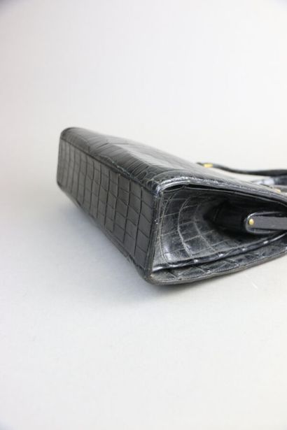 HERMÈS Paris
Pullman bag in black crocodile
Gold-plated...