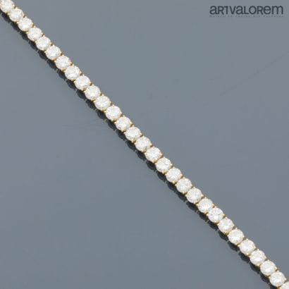 River bracelet in 750°/°° yellow gold adorned...