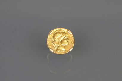 Ring in yellow gold 750°/°° set with a 20-franc...