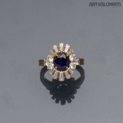 Ring in yellow gold 750°/°° centered on a...
