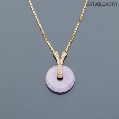 750°/°° yellow gold necklace adorned with...