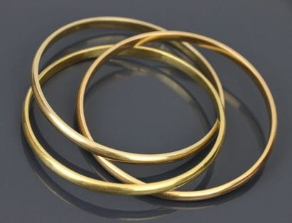 Three-ring bracelet in three-tone 750°/°°...