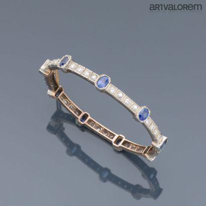 Openwork white and yellow gold 750°/°° bangle...