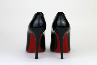 LOUBOUTIN
A pair of black patent leather...