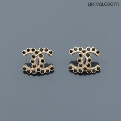 CHANEL
Pair of CC earrings in silver-plated...