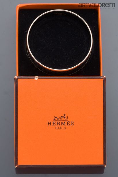 HERMÈS Paris
Jonc en métal argenté partiellement...