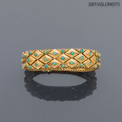 Bracelet souple articulé en or jaune 750°/°°...