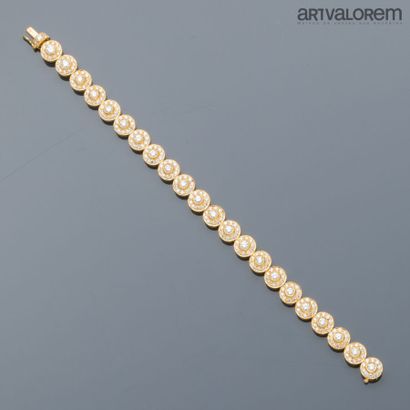 Bracelet en or jaune 750°/°° à maillons circulaires...
