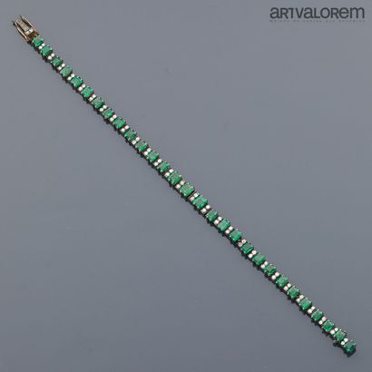 Bracelet rivière en or jaune 585°/°° orné...