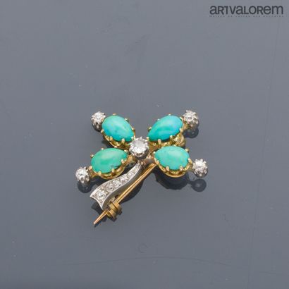 Broche porte bonheur en or jaune et gris...