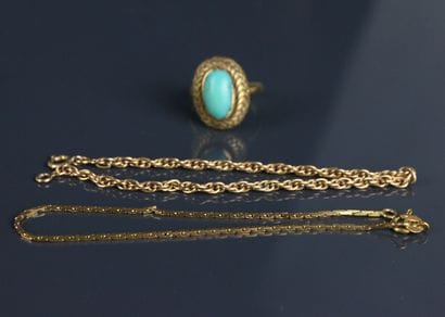 A yellow gold 750°/°° ring set with a turquoise...