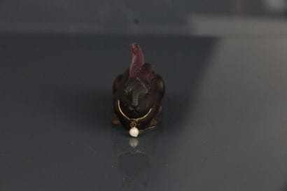Purple-tinted molded glass rabbit, gilded...
