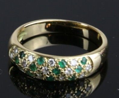 Ring in yellow gold 750°/°° paved with brilliant-cut...
