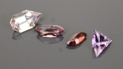 Four fancy-cut amethysts.
Total weight: 8.24...