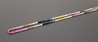 Strand of faceted synthetic sapphire beads...