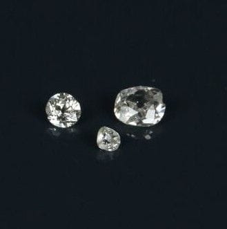 Three old-cut diamonds
Total weight: 0.57...