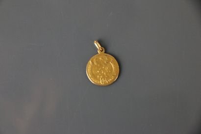 Religious medal in yellow gold 750°/°° representing...