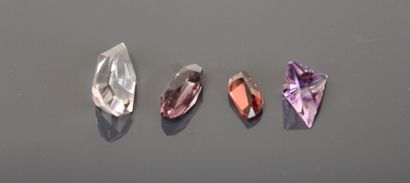 Four fancy-cut amethysts.
Total weight: 8.24...