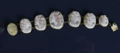 Gilded metal bracelet adorned with six resin...