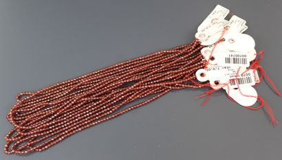 Ten strands of faceted garnet beads 
Diameter:...