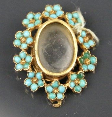 750°/°° yellow gold and glass oval photo...