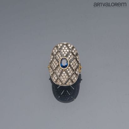 Ring in yellow gold 750°/°° and silver, the...