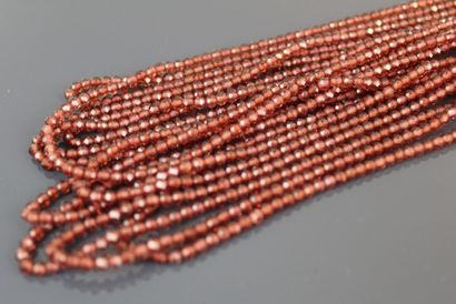 Ten strands of faceted garnet beads 
Diameter:...