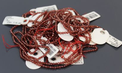 Ten strands of faceted garnet beads 
Diameter:...