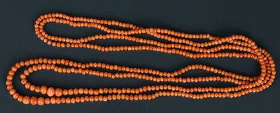 Long necklace made of falling coral beads....