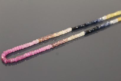 Strand of faceted synthetic sapphire beads...