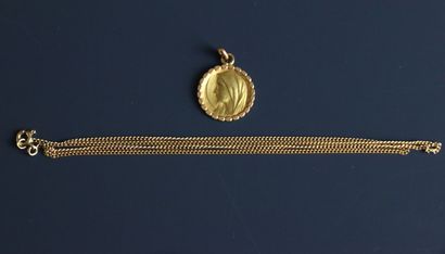 Chain and religious medal depicting the Virgin...