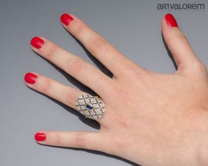 Ring in yellow gold 750°/°° and silver, the...