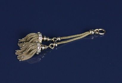 Pendant in 750°/°° yellow gold adorned with...