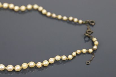 Necklace of 73 round, drop and oval untreated...