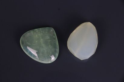 Two chrysoprases, one cabochon-cut stylizing...